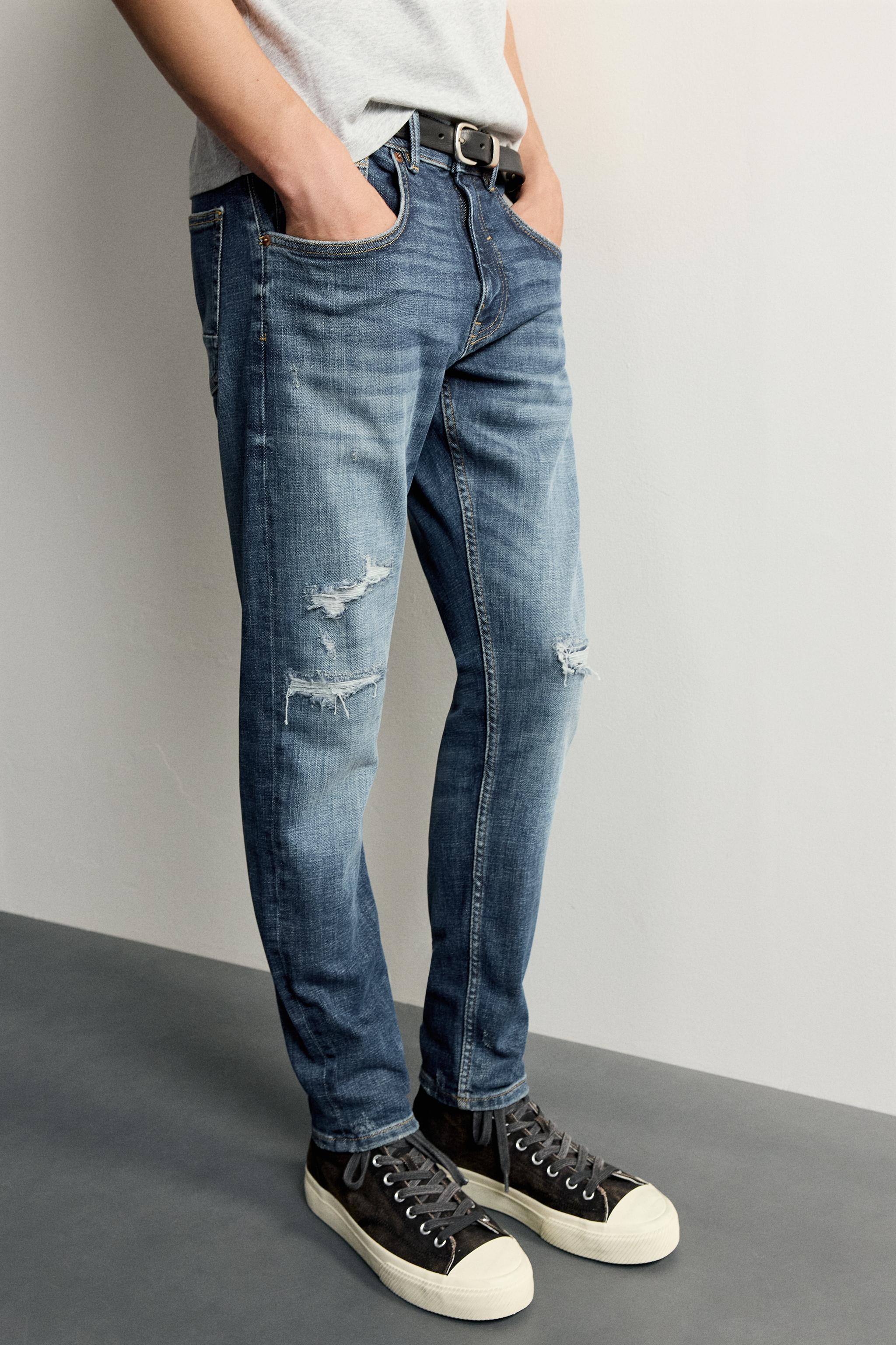 DISTRESSED SKINNY FIT JEANS